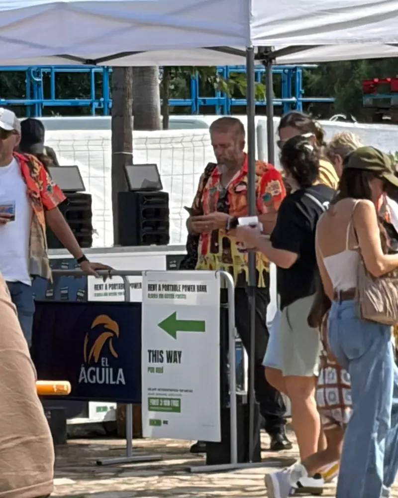 Love to Rock festival: festival-goers next to the stations in the afternoon.